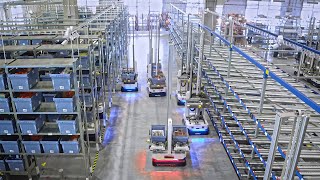 Major e-grocer uses AI robots to consolidate, buffer and dispatch orders in micro fulfillment center