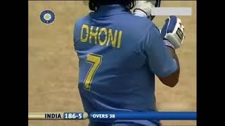 Dhoni playing with icepack on his back