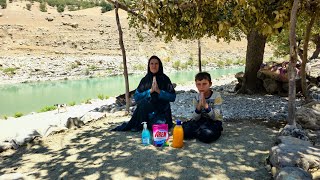 Exiled Nomadic Mother and Son Build Shelter by the River to Survive the Summer Heat
