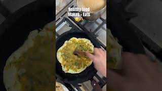 Healthy homemade breakfast – fresh omelet with strong tea made from pure milk.