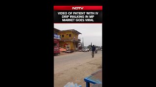 Madhya Pradesh News | Video Of Patient With IV Drip Walking In Madhya Pradesh Market Goes Viral