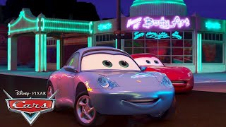The Neon Lights Turn On At Radiator Springs | Pixar Cars | @disneyjr