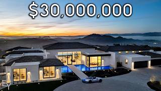 素晴らしい眺望を誇る、カリフォルニアの丘の上の 3000 万ドルの巨大マンションを巡ります。
