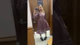 trying on vintage dresses at the thrift store!