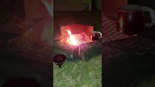 Fire pit at night with coffee