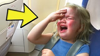 The GIRL caught everyone's attention during the flight because of her strange behavior.