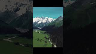 Xinjiang Panorama: Endless Grasslands, Majestic Mountains & Crystal Rivers