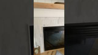 I changed my mind a lot with this fireplace but vertical shiplap won! #diyhome #fireplace