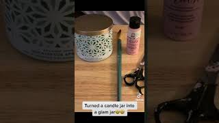 Used chalk paint and floral transfers to repurpose this candle jar to glam jar