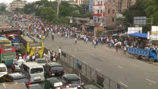 Bangladesh police clash with protesters blockading capital | AFP
