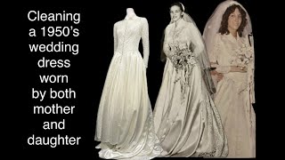 A yellowed lace and satin wedding dress worn by 2 generations is cleaned and ready for another bride