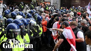 Protesters clash with police at far-right rally in London