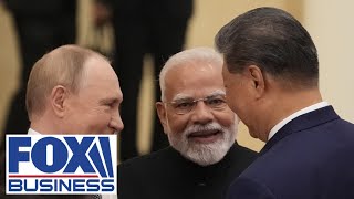 SHANGHAI SHOCK: Modi joins Jinping and Putin in anti-US summit