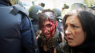 #MarchaMinera 11/07/2012 13:51 -  Cargas y porrazo en la cabeza a chica en el suelo