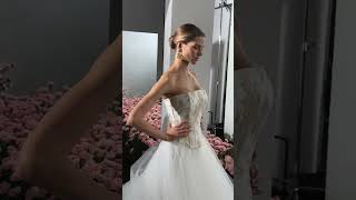 Unique mermaid wedding dress with gold detailing in the corset